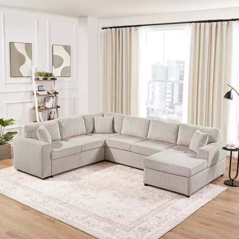 Divano componibile oversize in velluto a coste con chaise longue e tre morbidi cuscini decorativi